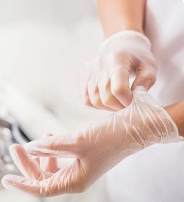 घर्षण प्रतिरोध डिस्पोजेबल विनील दस्ताने 30 सेमी घरेलू स्टेरिल विनील परीक्षा दस्ताने